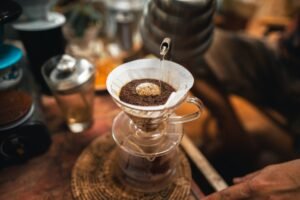 Closeup of hands barista make coffee,Drip coffee
