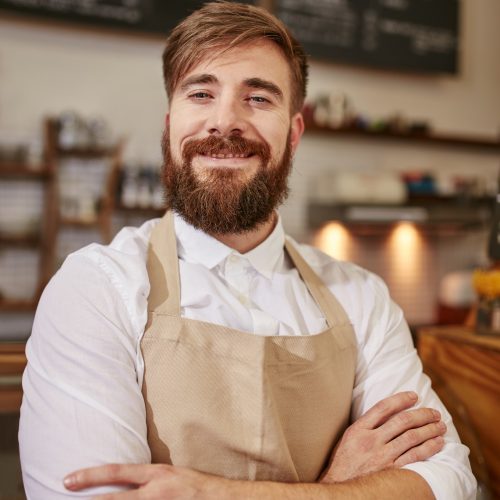 happy-young-barista-at-work.jpg